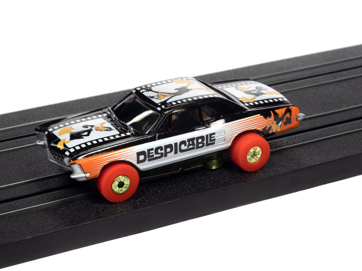 Black and white Looney Tunes Thunderjet toy car on a track for Auto World SC363
