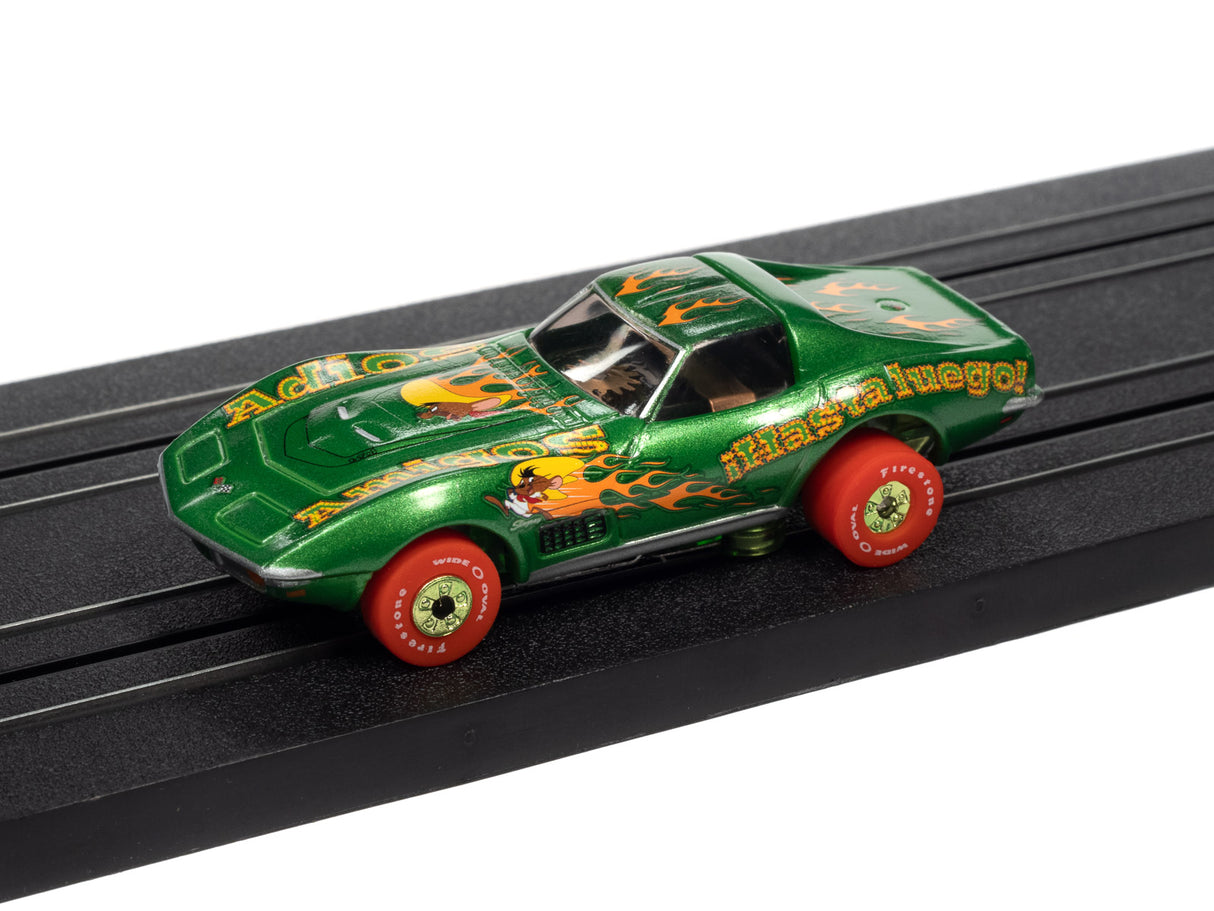 Green Looney Tunes Thunderjet toy car on a black track for Auto World SC363