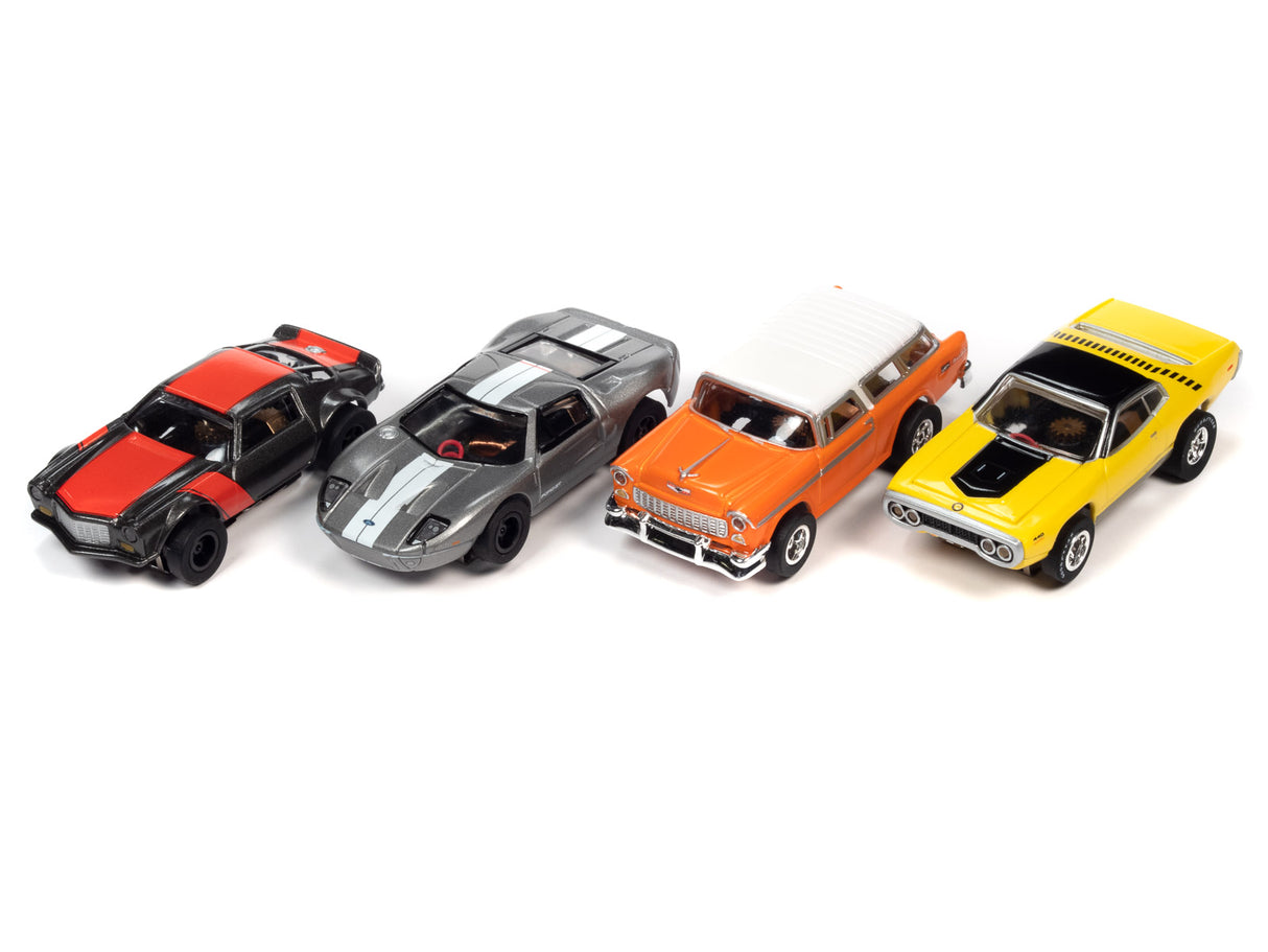 Five slot cars lined up: red, gray, orange, white, and yellow for Auto World SC366