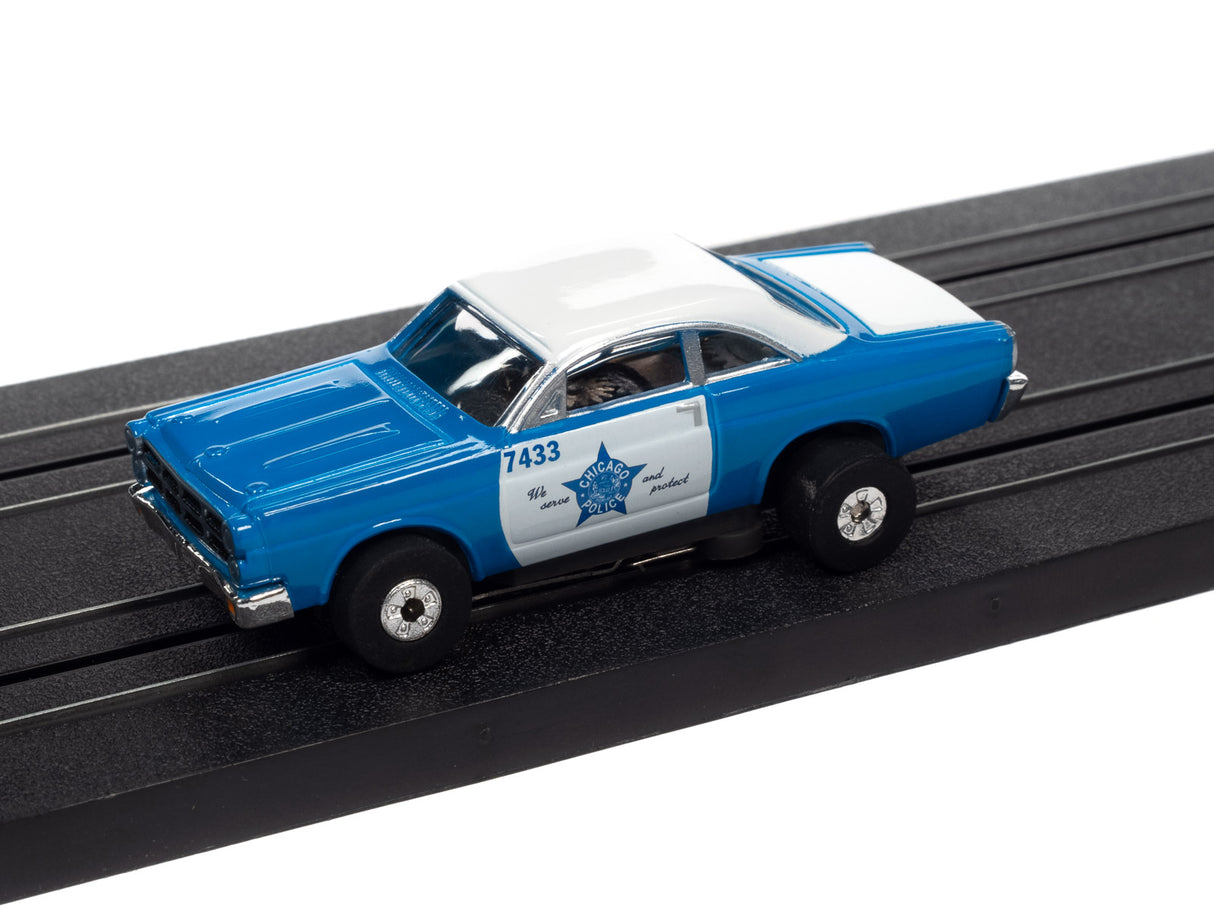 Blue and white police car toy on black track for Auto World SC367