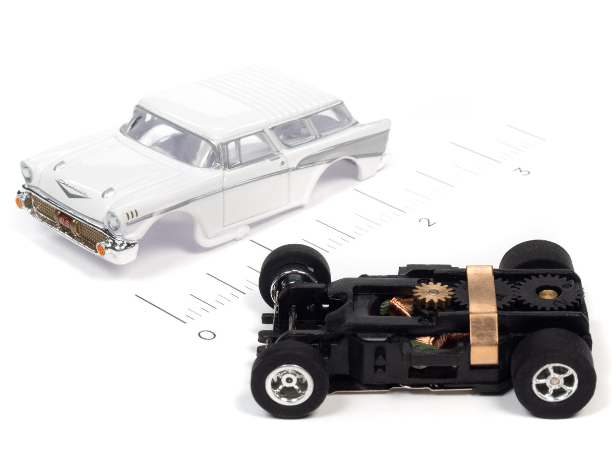 White slot car model with visible undercarriage and wheels for Auto World SC368