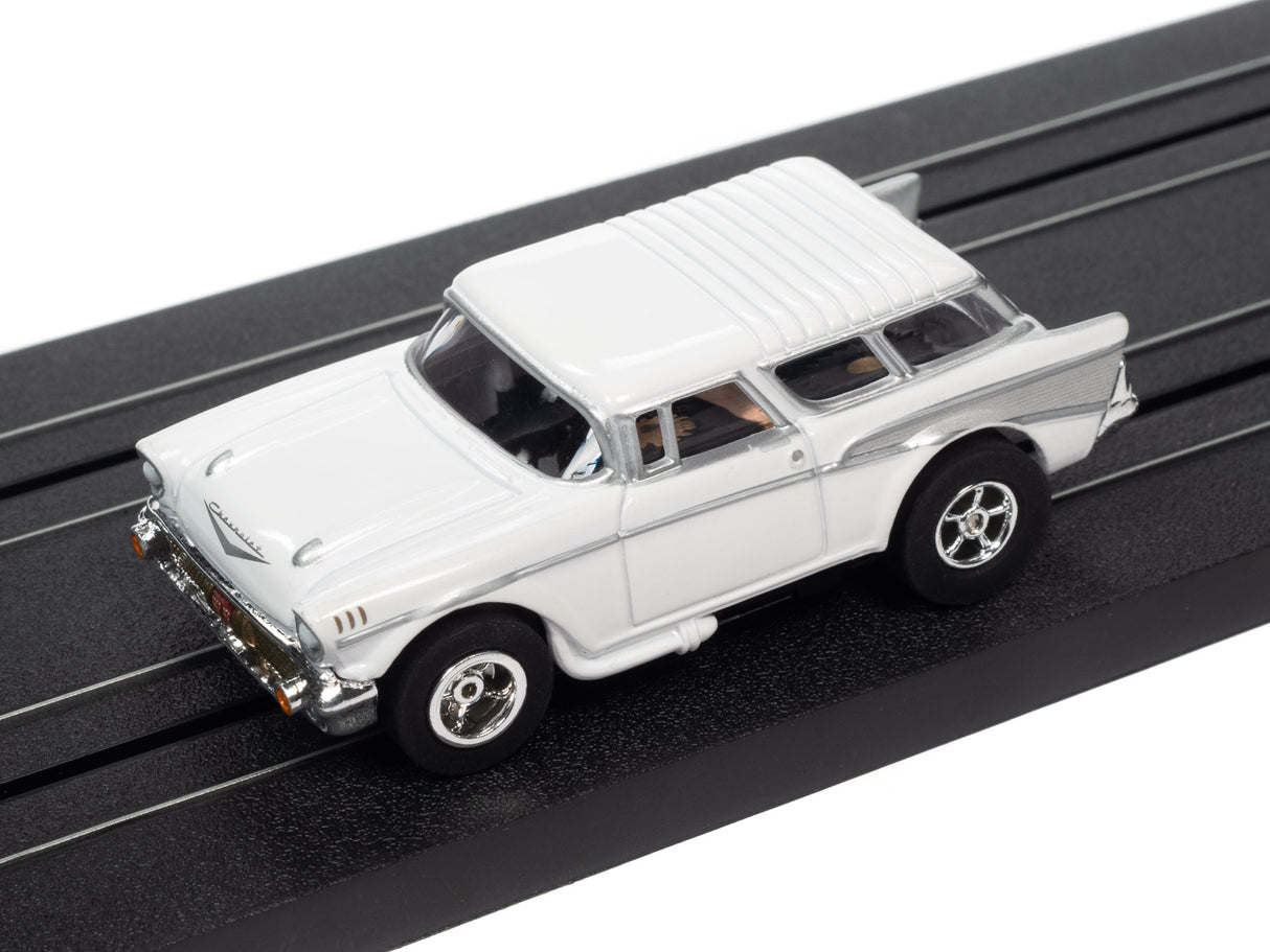 White classic car toy on black track for Auto World SC368