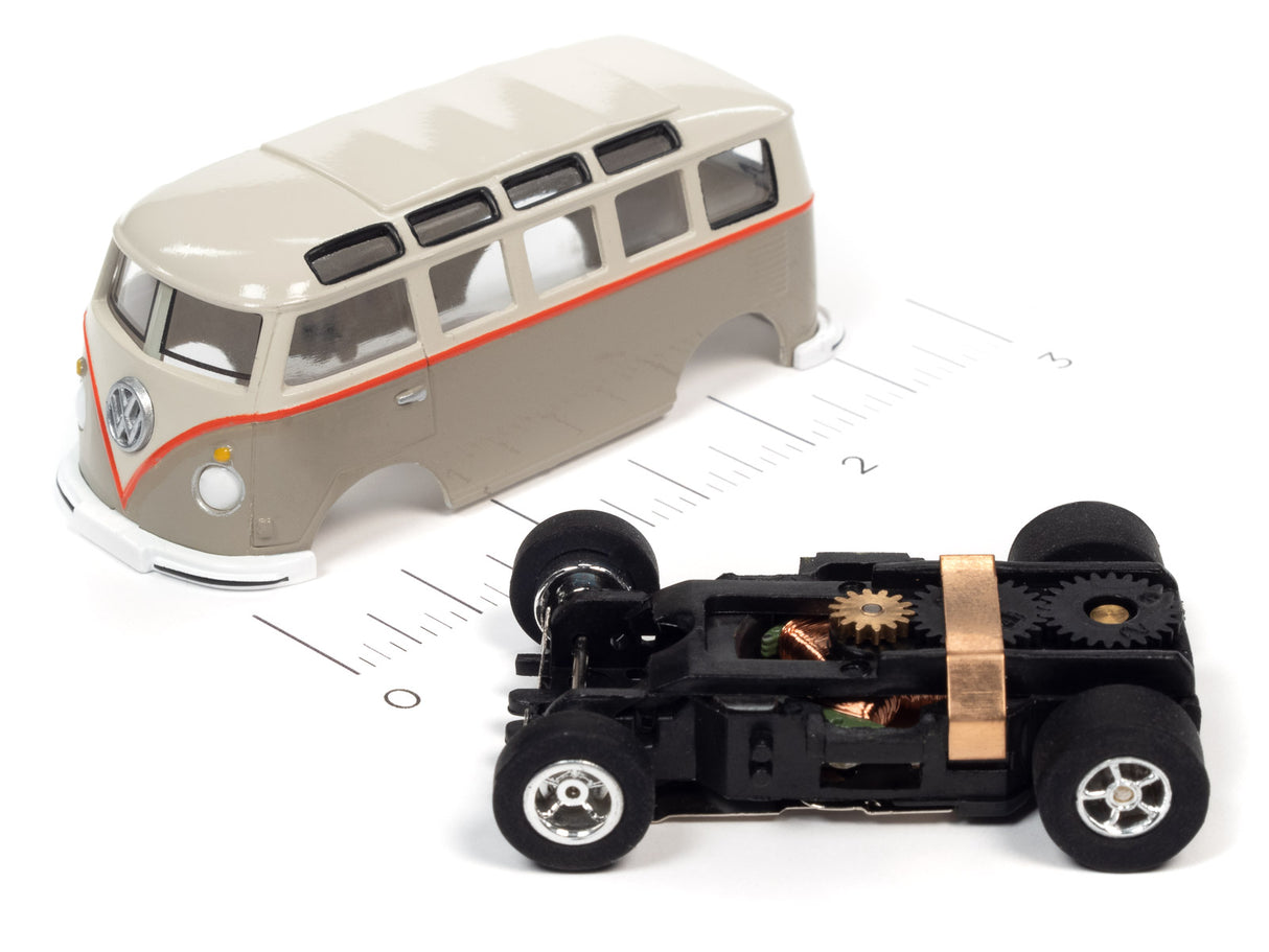 Toy model bus and car chassis on a ruler for scale comparison for Auto World SC368