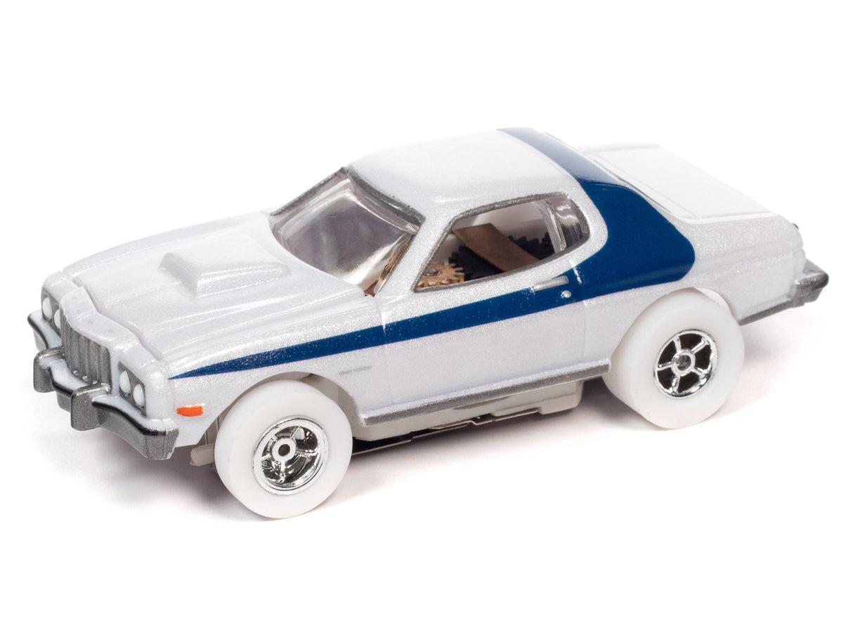 White and blue slot car toy, viewed from the side for Auto World SC368