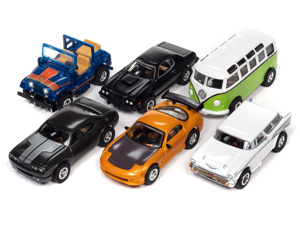 Assortment of slot car toy cars on white background for Auto World SC368