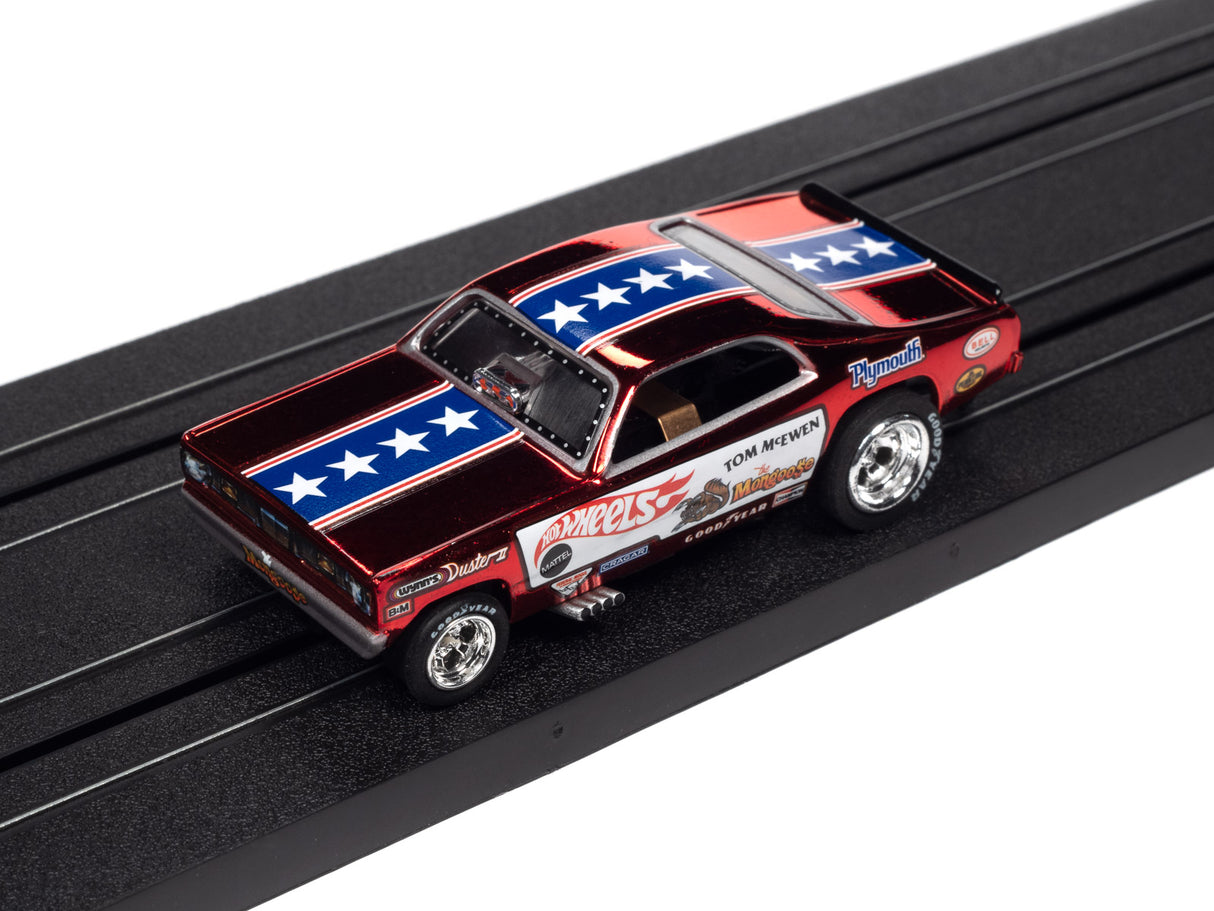 Red and blue slot car race car on a black track for Auto World SC369