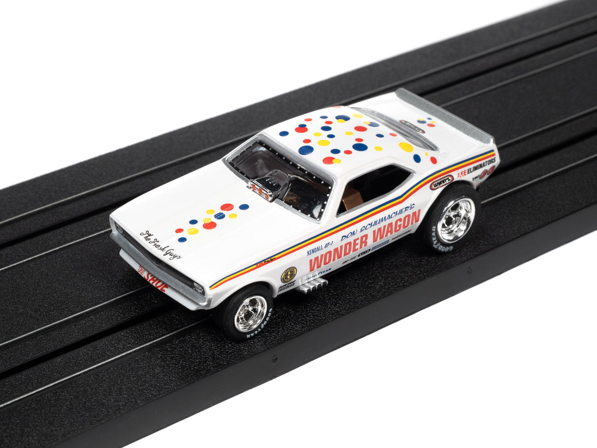 White race car toy on black track with colorful dots and "WONDER WAGON" text for Auto World SC369
