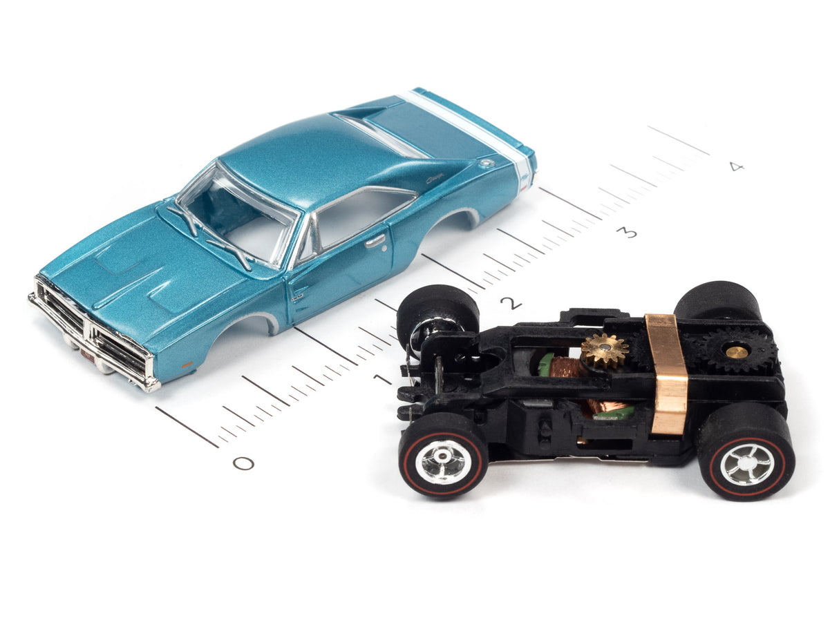 Slot car and chassis on a ruler for scale comparison for Auto World SC373