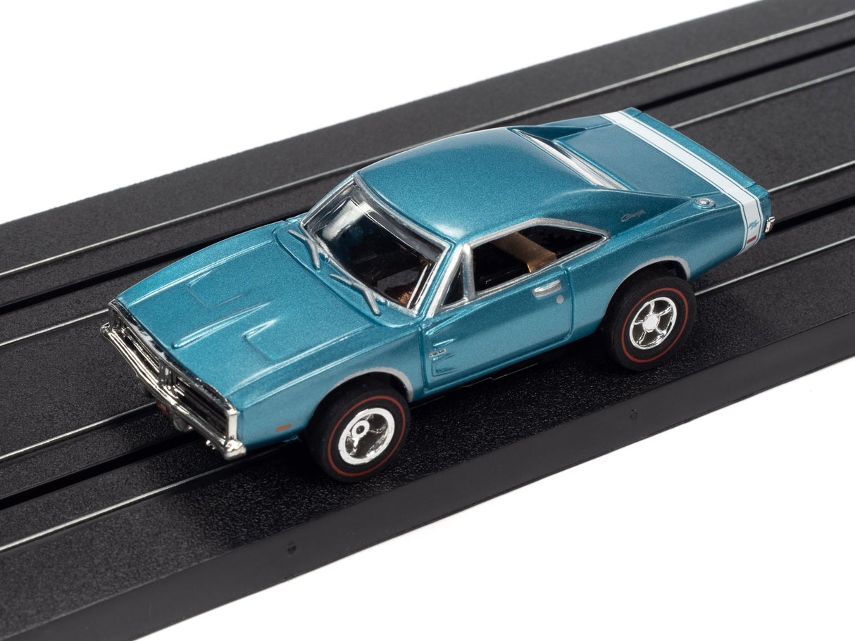 Blue slot car on a black track for Auto World SC373