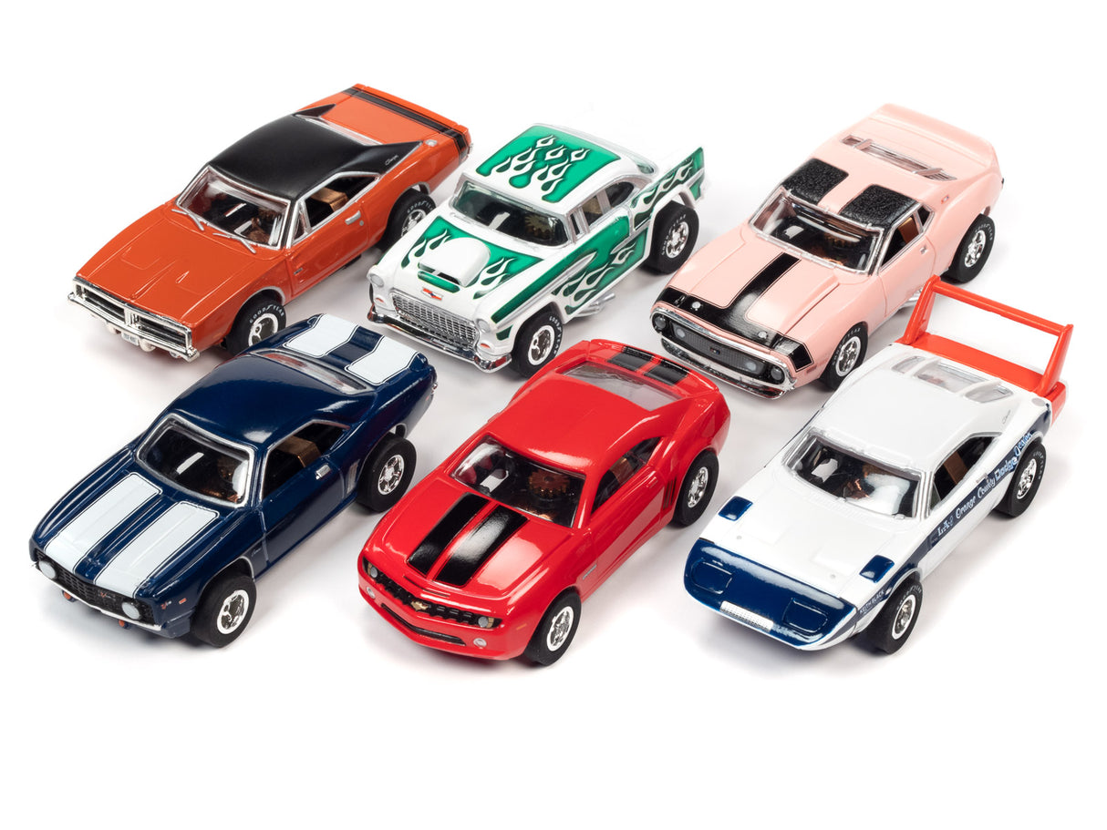 Assortment of slot car toy race cars on white background for Auto World SC373