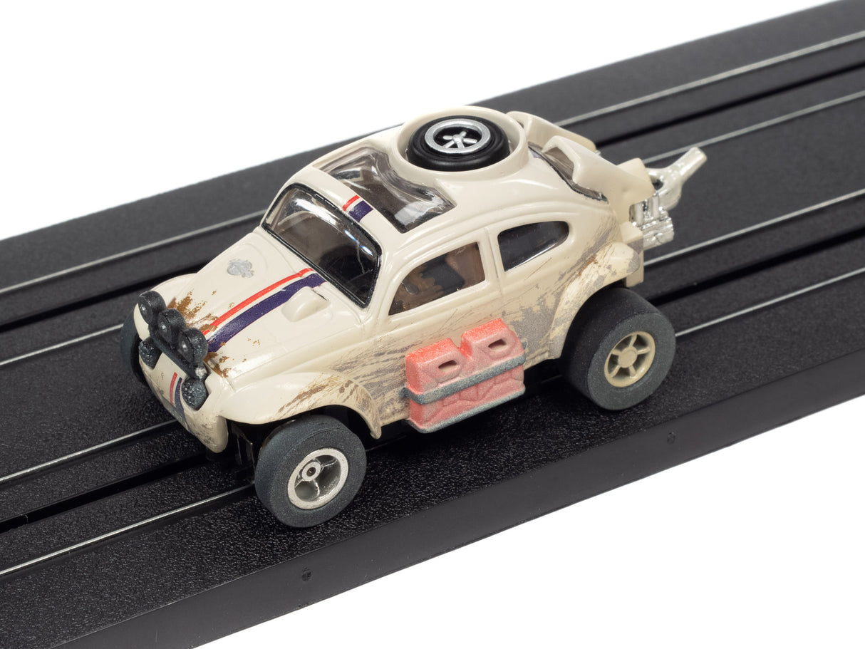 White off-road toy car on black track for Auto World SC375, track view