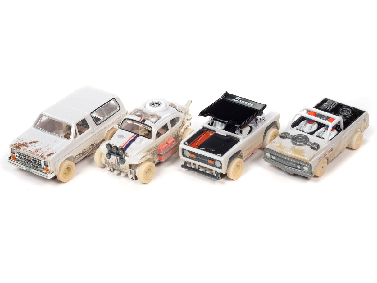 Assortment of slot car off-road vehicles in various models and colors for Auto World SC375