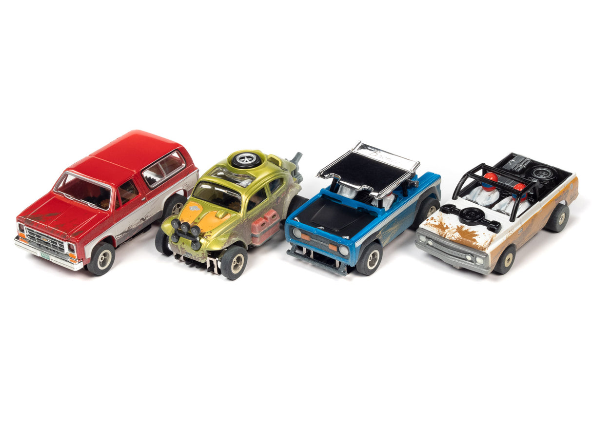 Five slot car off-road vehicles lined up: red SUV, green jeep, blue truck, and black buggy for Auto World SC375