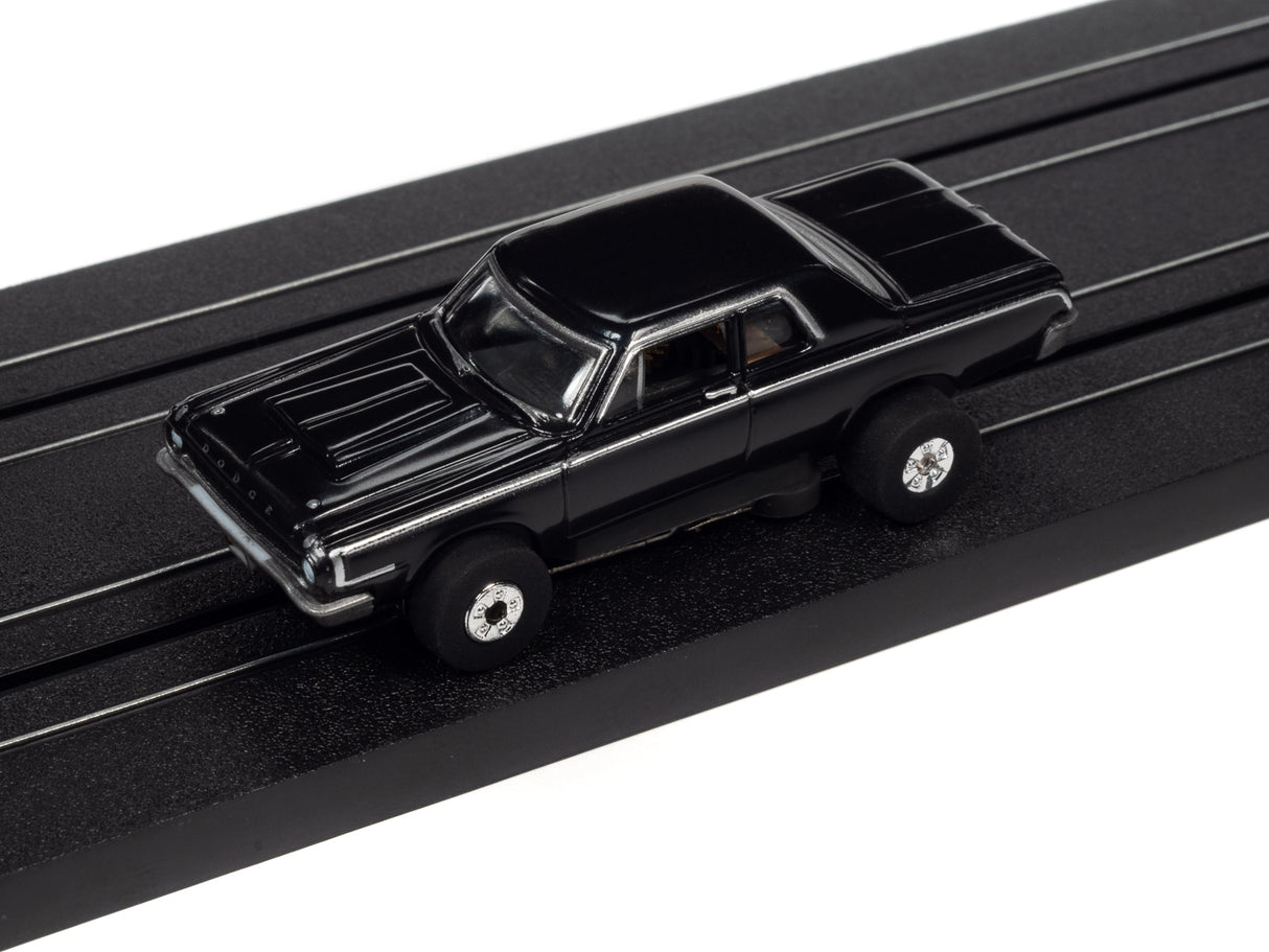 Black slot car on a black track for Auto World SC379