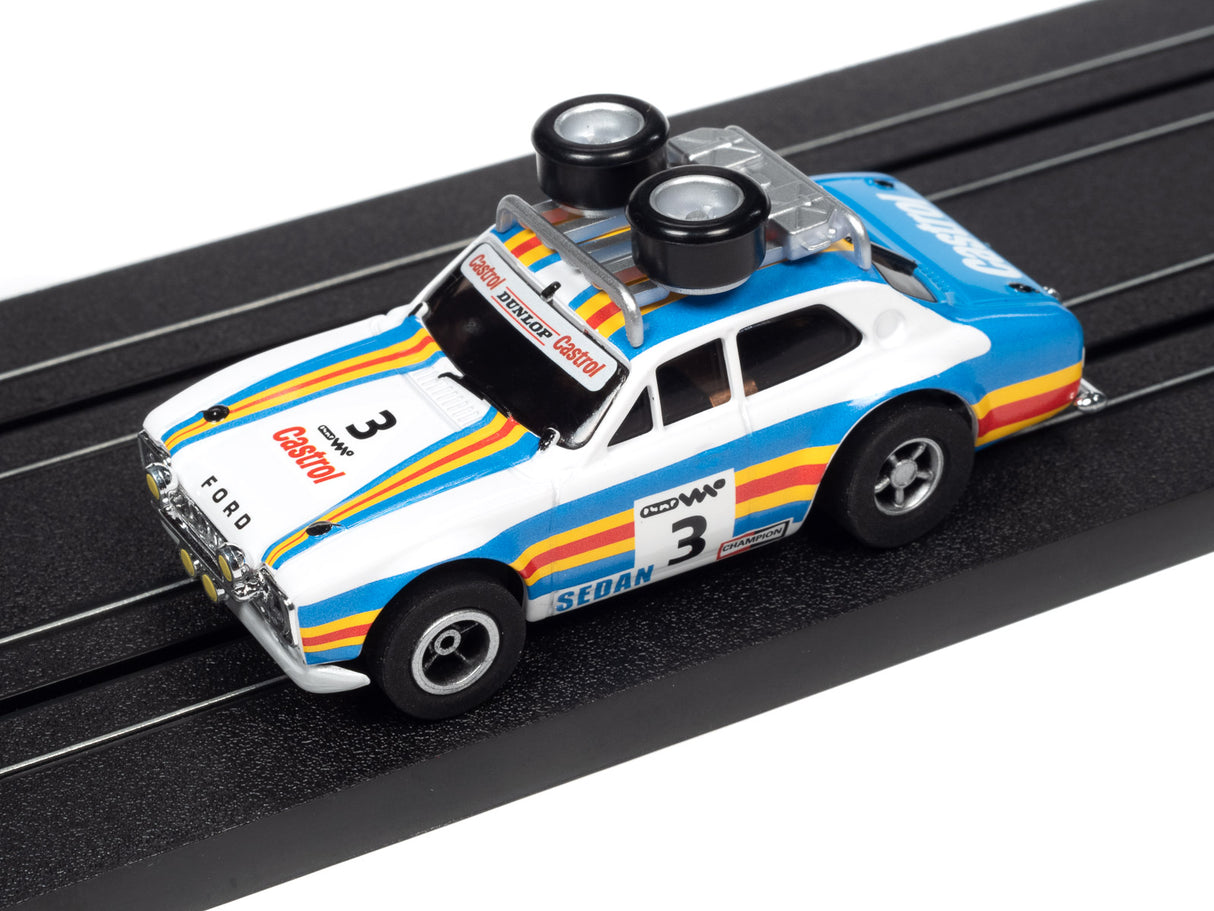 White and blue Ford sedan race car model on a black track for Auto World SC380