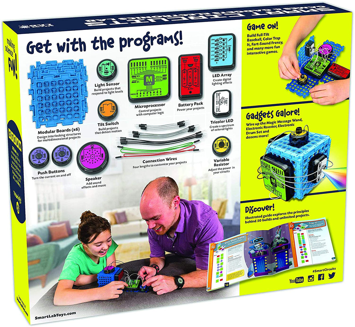 Electronics kit components laid out with people building circuits for Smart Lab 00485
