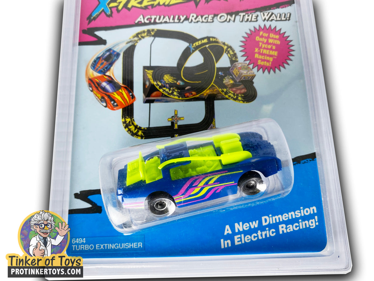 Blue and yellow remote-controlled race car toy in packaging for Tyco 6494