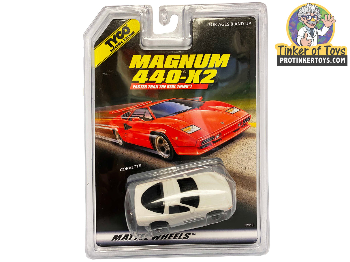 White and red slot car toy cars in blister packaging for Tyco 32265