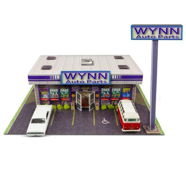 Model kit of an auto parts store with cars and signage for Innovative Hobby Supply BK6435