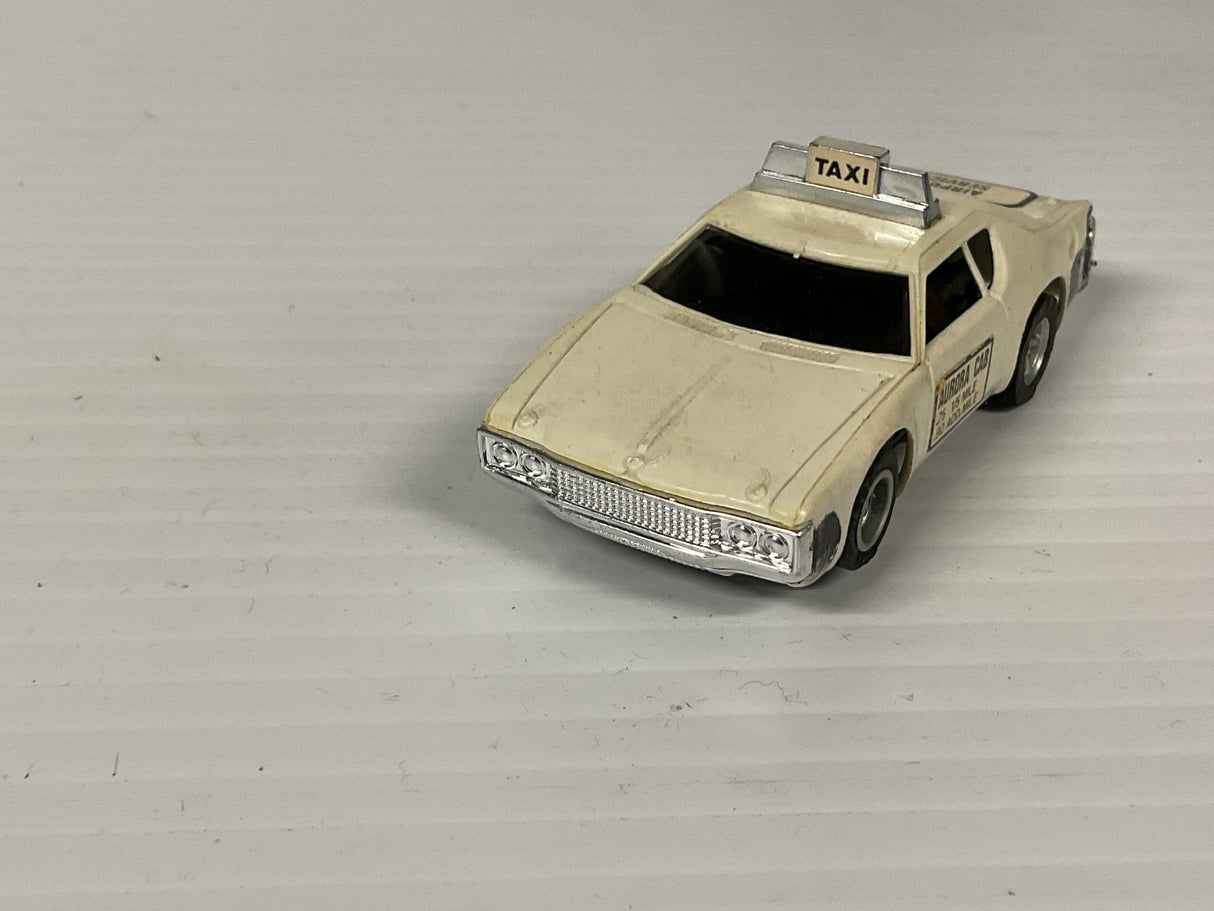 Aurora AFX non-magnatraction Matador Taxi White w/scuff mark  | 1938 | Aurora - AFX