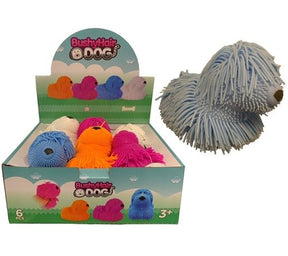 Assortment of colorful, fluffy dog toys and one blue, stuffed dog toy for Handee NV3624