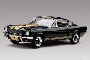 Black and gold 1:24 scale model of a 1966 Shelby GT350H sports car for Revell 12482