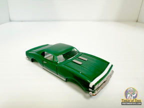 Dark green 1967 Camaro slot car with white racing stripes for Model Motoring MM02031, front view
