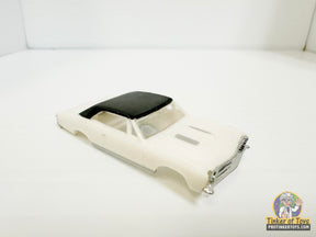 White and black 1967 Chevelle SS model car with vinyl top for Model Motoring MM04080, front view