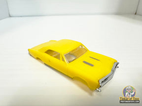 Yellow slot car of a 1967 Chevelle SS for Model Motoring MM03090