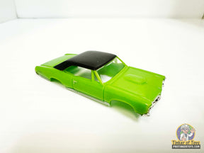 Light green 1967 GTO toy car with black vinyl top for Model Motoring MM06040, front view