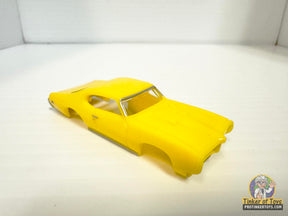 Yellow slot car of a 1969 GTO Hardtop for Model Motoring MM10090, front view