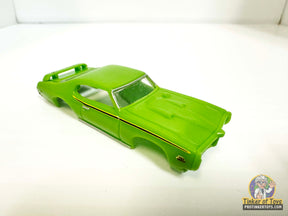 Green slot car of a 1969 GTO Judge for Model Motoring MM11040, front view
