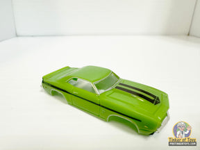 Light green 1969 Yenko Camaro slot car with black racing stripes for Model Motoring MM12042