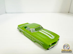 Light green 1969 Yenko Camaro slot car with white racing stripes for Model Motoring MM12041, front view
