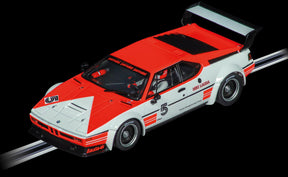 Red and white BMW M1 Procar model car, number 5, on a display base for Carrera Evolution 20027793