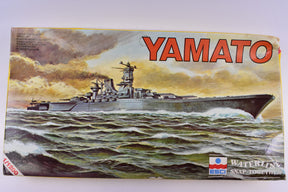 Yamato battleship model kit on water, featuring the name "YAMATO." for ESCI 408