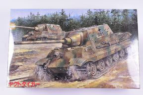 Two Tiger tanks in a muddy, wooded setting, painted model kit for Fujimi