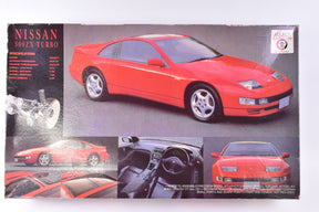 Red sports car model kit, front and side views, for assembly for Fujimi Nissan 300ZX Turbo 1:24