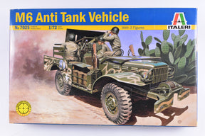 Model kit box art: M6 Anti Tank Vehicle with three figures in a desert setting for Italeri