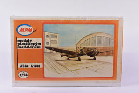 A model kit box featuring an A-300 aircraft on a tarmac for MPM Model Kits Aero A-300 1/72 Scale