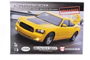 Yellow 2006 Charger model kit box art, showing assembled car for Testors 5316