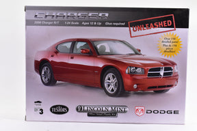 Model kit box art showing a red 2006 Dodge Charger for Testors 5315