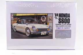 1/32 scale model kit box art featuring a 1964 Honda S600 car for Arii 41003