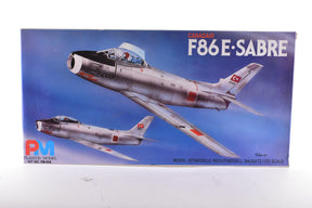 Model kit box art showing two F86E Sabre jet aircraft for PM Plastic Model