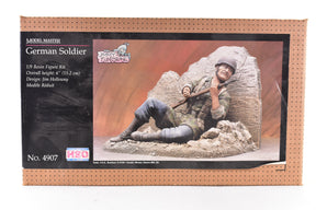 German soldier model kit box art showing a soldier kneeling by rubble for Testors