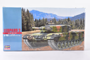 German Leopard 2 tank model kit box art featuring the tank in a forest setting for Hasegawa