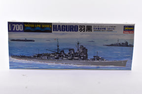 Haguro Japanese heavy cruiser model kit box art showing the ship on the water for Hasegawa 303