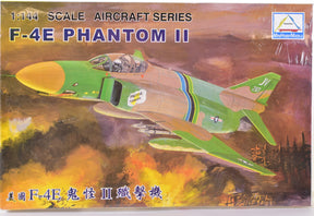 Green F-4E Phantom II jet fighter model in flight against a dramatic sky for Mini Hobby