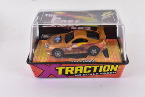 Gold Toyota Supra model car in clear display box for Bought Collections Unidentified supra-gold