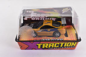 Gold Mitsubishi Eclipse race car in clear plastic box for Bought Collections Unidentified eclipse-gold